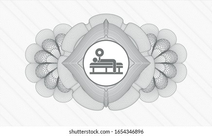 Grey rosette or money style emblem with bench press icon inside