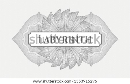 Grey rosette or money style emblem with text Labyrinth inside