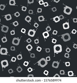 Grey Roulette construction icon isolated seamless pattern on black background. Tape measure symbol.  Vector Illustration