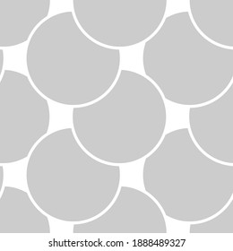 Grey seamless geometric pattern made up of circles.