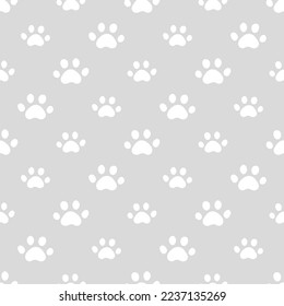 Grey seamless pattern with white cat or dog paws
