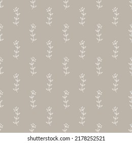 Patrón gris sin fisuras con flores blancas.