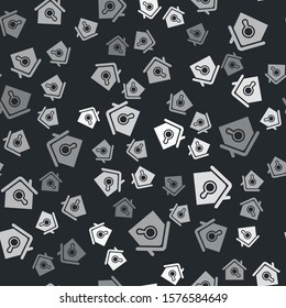 Grey Search house icon isolated seamless pattern on black background. Real estate symbol of a house under magnifying glass.  Vector Illustration
