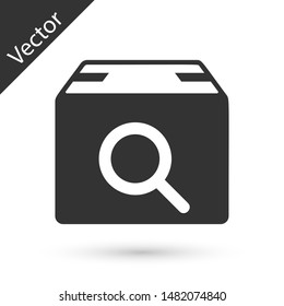 Grey Search package icon isolated on white background. Parcel tracking symbol. Magnifying glass and cardboard box. Logistic and delivery.  Vector Illustration