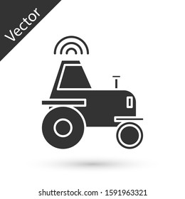 Grey Self driving wireless tractor on a smart farm icon isolated on white background. Smart agriculture implement element.  Vector Illustration