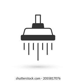 Cabeza de ducha gris con chorros de agua que fluyen icono aislado en fondo blanco.  Vector