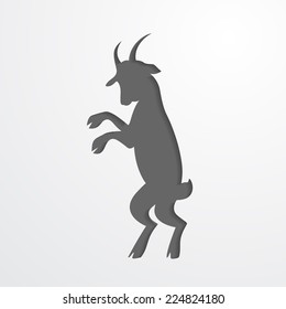 Grey silhouette of a goat - symbol of 2015. Vector illustration