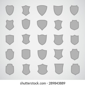 Grey silhouette shield design set of various shapes. EPS 10