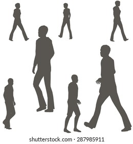 Grey silhouettes of walking people. It can be used to illustrate the rapid rhythm of urban life