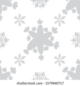 Grey silver or monochrome light seamless snowflakes patterns. Doodle cute design. Great for print, pakage, web pages, clothes. New year and Christmas tender winter style