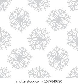 Grey silver or monochrome light seamless snowflakes patterns. Doodle cute design. Great for print, pakage, web pages, clothes. New year and Christmas tender winter style