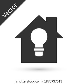 Grey Smart house and light bulb icon isolated on white background.  Vector