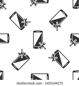 Grey Smartphone with screwdriver and wrench icon isolated seamless pattern on white background. Adjusting, service, setting, maintenance, repair, fixing.  Vector Illustration