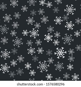 Grey Snowflake icon isolated seamless pattern on black background.  Vector Illustration