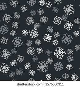 Grey Snowflake icon isolated seamless pattern on black background.  Vector Illustration