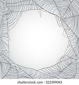 Grey spider's web background with copy space