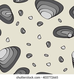 Grey stones and peeble on sand.