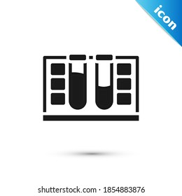 Grey Test tube with water drop icon isolated on white background.  Vector