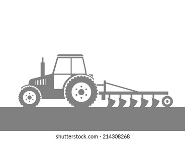 Grey tractor on field  