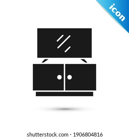 Icono de soporte de mesa de TV gris aislado en fondo blanco.  Vector