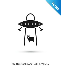 Grey UFO abducts cow icon isolated on white background. Flying saucer. Alien space ship. Futuristic unknown flying object.  Vector Illustration