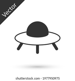 Grey UFO flying spaceship icon isolated on white background. Flying saucer. Alien space ship. Futuristic unknown flying object.  Vector