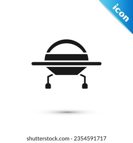 Grey UFO flying spaceship icon isolated on white background. Flying saucer. Alien space ship. Futuristic unknown flying object.  Vector Illustration