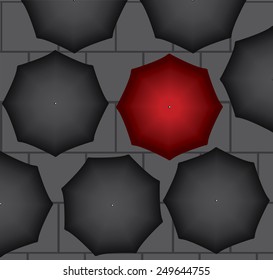 Grey umbrellas with one red one,symbolising individialism success