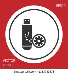 Grey USB flash drive and gear icon isolated on red background. Adjusting app, service concept, setting options, maintenance, repair, fixing. White circle button. Vector Illustration