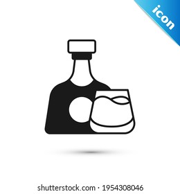 Grey Whiskey bottle and glass icon isolated on white background.  Vector
