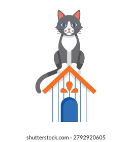 A grey and white cat sits on top of a dog house with an orange roof outdoors
