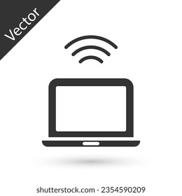 Icono de portátil inalámbrico gris aislado en fondo blanco. Internet de cosas con conexión inalámbrica.  Vector