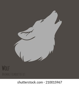 Grey Wolf Silhouette on brown background. vector illustration