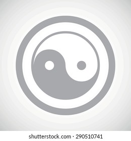 Grey ying yang symbol in circle, on white gradient background