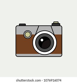 A grey-brown camera isolated on a grey background. Vintage camera in a Flat style. Icon. Vector illustration.