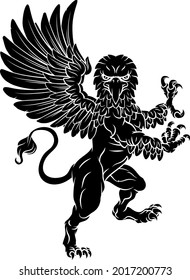 A griffin also known as a gryphon or griffon with lion body, wings and eagle head. Rampant standing on hind legs coat of arms crest mascot 