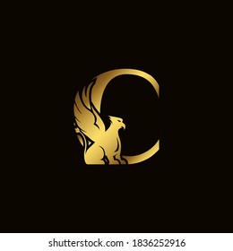 Griffin silhouette inside gold letter C. Heraldic symbol beast ancient mythology or fantasy. Creative design elements for logotype, emblem, monogram, icon or symbol for company, corporate, brand name.