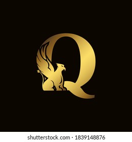 Griffin silhouette inside gold letter Q. Heraldic symbol beast ancient mythology or fantasy. Creative design elements for logotype, emblem, monogram, icon or symbol for company, corporate, brand name.