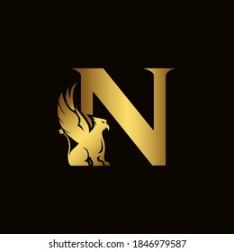 Griffin silhouette inside gold letter N. Heraldic symbol beast ancient mythology or fantasy. Creative design elements for logotype, emblem, monogram, icon or symbol for company, corporate, brand name.