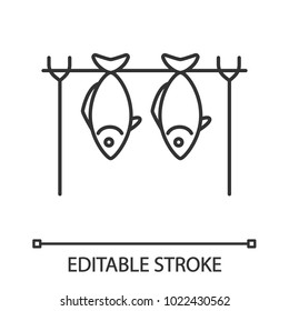 Grilled fish linear icon. Stockfish. Thin line illustration. Drying fish. Contour symbol. Vector isolated drawing. Editable stroke
