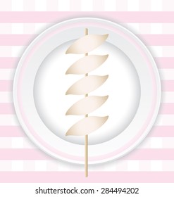 Grilled fish meatball on a plate on orange background pattern.