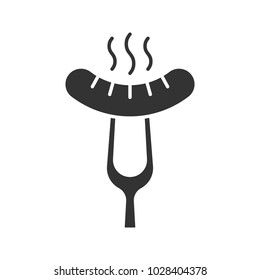 Grilled sausage on fork glyph icon. Silhouette symbol. Bratwurst. Negative space. Vector isolated illustration