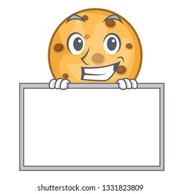 Grinning with board oat cookies above wooden character boards