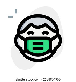 Grinning boy with a face mask isolated on a white background