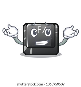 Grinning button f7 in the shape mascot