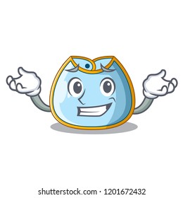 Grinning cartoon baby bib on a clothesline