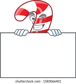 Grinning christmas candy cane cartoon character style hides behind a board