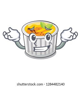 Grinning creme brule in white cartoon bowl