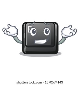 Grinning E button attached to cartoon keyboard