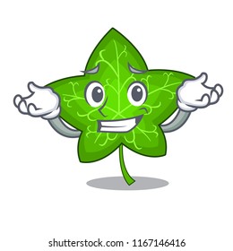 Grinning green ivy leaf on character cartoon